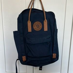 Fjallraven Kånken Dark Blue Backpack with Brown Accents
